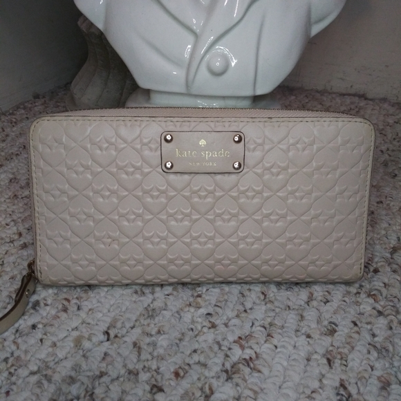 kate spade Handbags - Kate Spade Cream Leather Three Dimensional Spade Patterned Zip Around Wallet